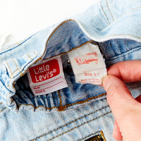 Vintage Levi's "Protect the Rainforest" White Tab light wash cinch waist denim adventure shorts · Size 4T+