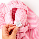 Vintage OshKosh pink engineer stripe bubble overalls on paper tag, 12 months