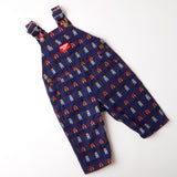 Vintage OshKosh cowboy farmer + tractor theme AOP overalls · Size 12 months